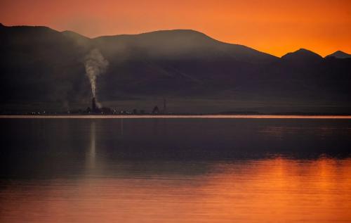 (Trent Nelson | The Salt Lake Tribune) US Magnesium, seen across the Great Salt Lake from Stansbury Island on Saturday, March 26, 2022.